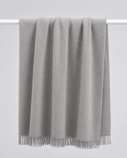 grey soft woven knit throw blanket with a textured diamond pattern and fringe - reversible