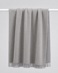  grey soft woven knit throw blanket with a textured diamond pattern and fringe - reversible