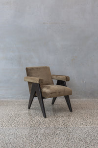 brown earth velvet armchairs with dark wooden legs