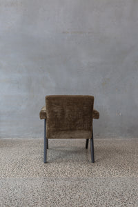 brown earth velvet armchairs with dark wooden legs