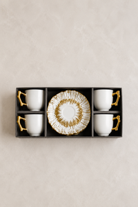 set of four plates and four espresso cups made of porcelain