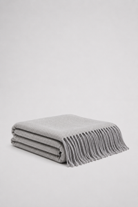  grey soft woven knit throw blanket with a textured diamond pattern and fringe - reversible