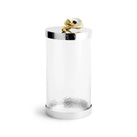 glass canisters with silver-toned steel bases and floral lids
