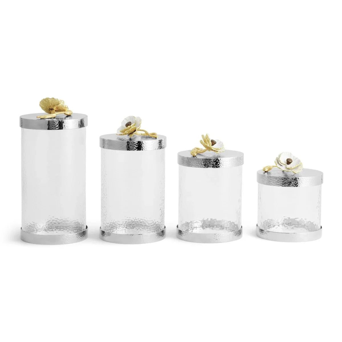 glass canisters with silver-toned steel bases and floral lids